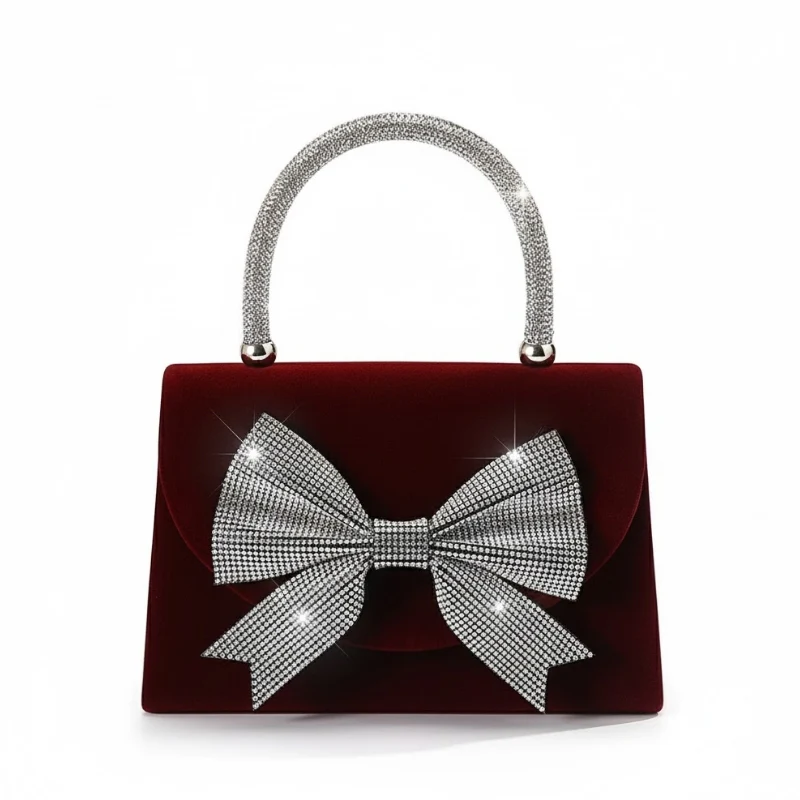Elegant Velvet Handbag with Oversized Crystal Bow