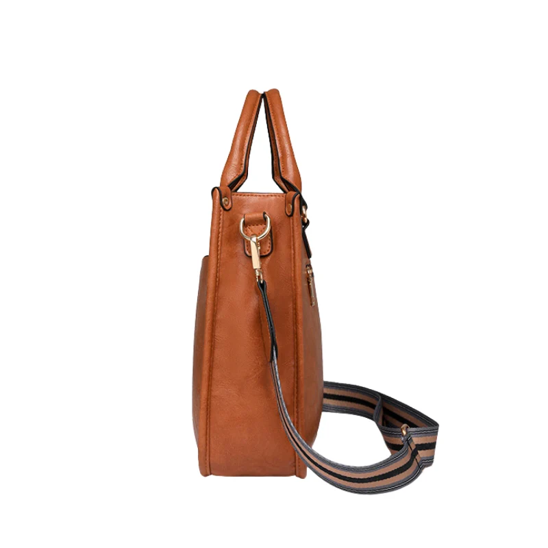 Modern Curved Twist Lock Asymmetrical Handbag - Image 3