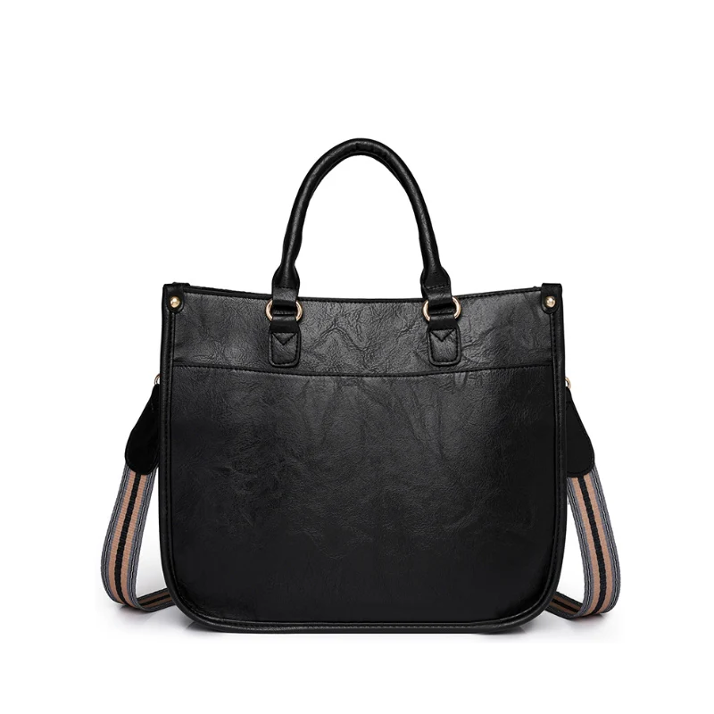 Modern Curved Twist Lock Asymmetrical Handbag - Image 6