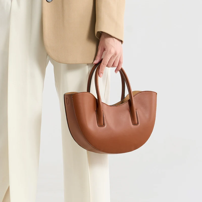 Sculptural Crescent Handbag with Accessory Pouch - Image 4