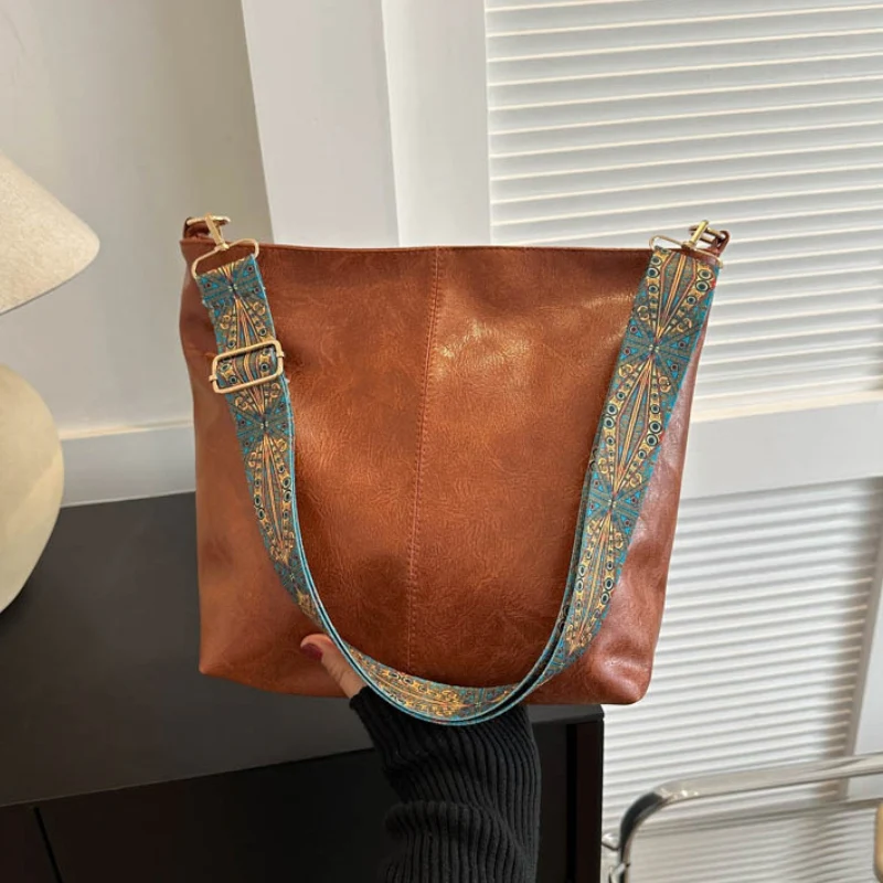 Women's Textured Leather Shoulder Bag with Patterned Strap - Image 3