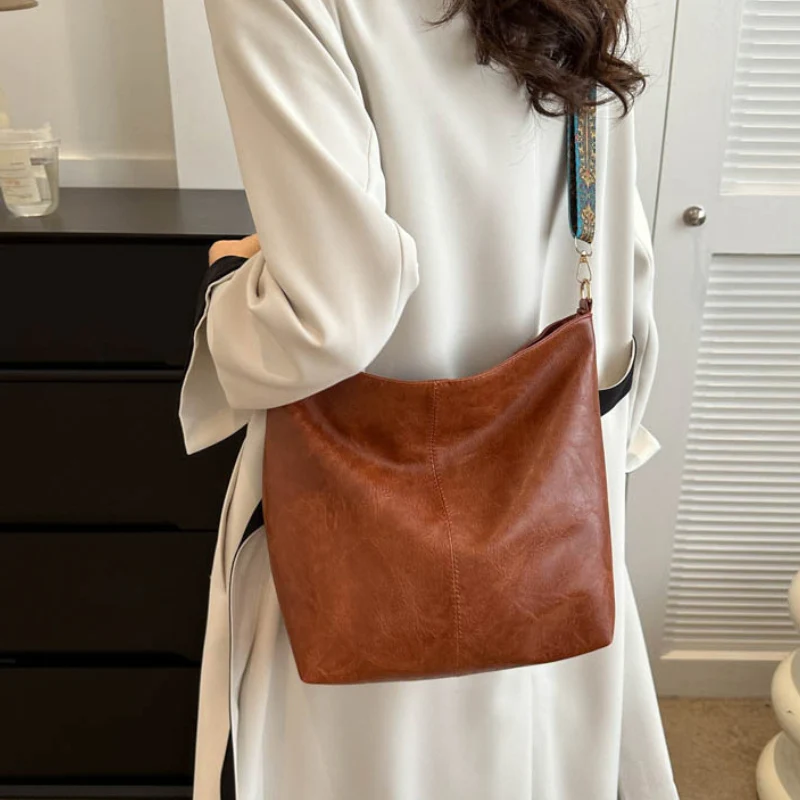 Women's Textured Leather Shoulder Bag with Patterned Strap - Image 4